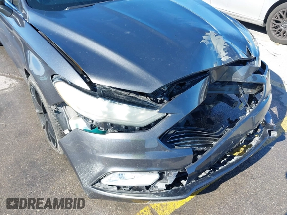 2018 Ford Fusion SE z VIN 3FA6P0H70JR191384, wystawiony jako IAAI lot #41340319 z przebiegiem 89 581 mil mil oraz . Historia ofert i sprzedaży dostępna na DreamBid. Obrazek 17.
