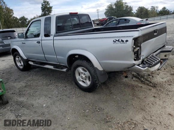 2000 Nissan Frontier XE with VIN 1N6ED26T0YC314102, listed as a Copart auction lot 83678264 with 174,419 mi miles and Salvage title. Bid and sale history available at DreamBid. Image 2.