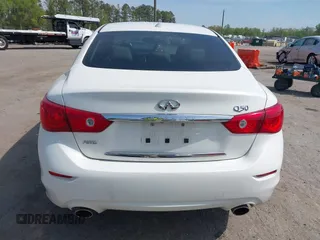 2015 Infiniti Q50 Premium with VIN JN1BV7AR0FM421592, listed as a IAAI auction lot 42070055 with 161,038 mi miles. Bid and sale history available at carsss.com. Image 16.