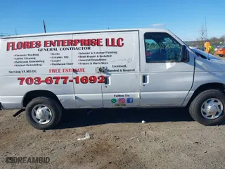2011 Ford Econoline Cargo Van Recreational with VIN 1FTNE2EW6BDA44841, listed as a IAAI auction lot 40803565 with 268,523 mi miles. Bid and sale history available at carsss.com. Image 14.