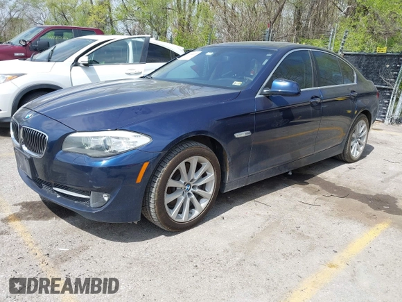 2013 BMW 5 Series 528i xDrive with VIN WBAXH5C52DD107297, listed as a IAAI auction lot 42004619 with 182,805 mi miles. Bid and sale history available at carsss.com. Image 2.