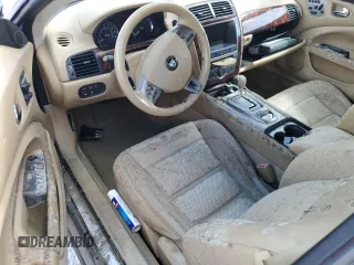 2007 Jaguar XK with VIN SAJWA44C779B12243, listed as a Copart auction lot 77239534 with 0 mi miles and Salvage Title. Bid and sale history available at carsss.com. Image 8.