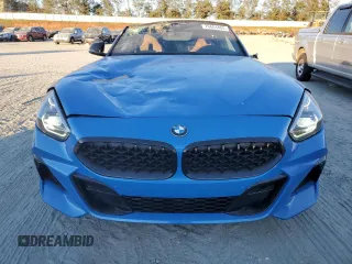 2022 BMW Z4 sDrive30i with VIN WBAHF3C02NWX38818, listed as a Copart auction lot 76604404 with 16,402 mi miles and Salvage Title. Bid and sale history available at carsss.com. Image 5.