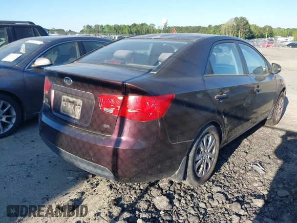 2010 Kia Forte EX with VIN KNAFU4A26A5306448, listed as a IAAI auction lot 42048677 with 172,095 mi miles. Bid and sale history available at carsss.com. Image 4.