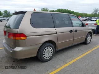 2003 Honda Odyssey LX z VIN 5FNRL18513B106306, wystawiony jako IAAI lot #42308429 z przebiegiem Nie podano mil oraz . Historia ofert i sprzedaży dostępna na DreamBid. Obrazek 4.