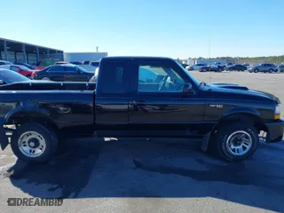 1999 Ford Ranger XL with VIN 1FTYR14X6XTA83979, listed as a IAAI auction lot 41355593 with 201,284 mi miles. Bid and sale history available at carsss.com. Image 13.