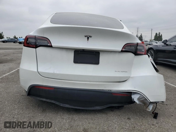 2022 Tesla Model Y Long Range z VIN 7SAYGDEE5NF352075, wystawiony jako Copart lot #50799895 z przebiegiem 11 597 mil mil oraz Szkoda całkowita • Salvage title. Historia ofert i sprzedaży dostępna na DreamBid. Obrazek 6.