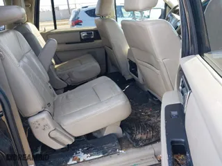 2015 Lincoln Navigator L with VIN 5LMJJ3JT3FEJ00335, listed as a IAAI auction lot 41585554 with 163,841 mi miles. Bid and sale history available at carsss.com. Image 8.