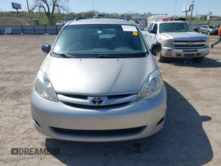 2009 Toyota Sienna CE with VIN 5TDZK23C19S263613, listed as a IAAI auction lot 41983708 with 162,395 mi miles. Bid and sale history available at carsss.com. Image 12.