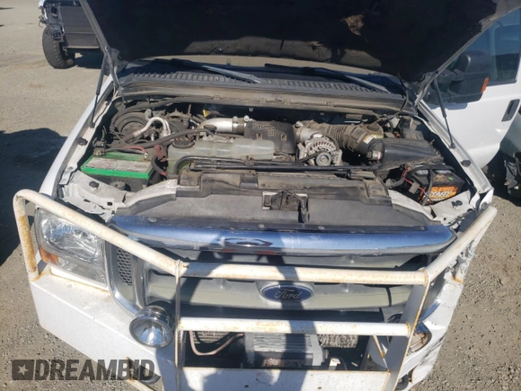 1999 Ford Super Duty F-250 XL with VIN 1FTNW21FXXEC06071, listed as a Copart auction lot 67777614 with 204,661 mi miles and Salvage Title. Bid and sale history available at carsss.com. Image 11.