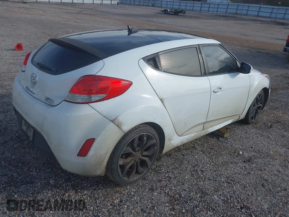 2013 Hyundai Veloster w/Gray Int with VIN KMHTC6AD4DU140121, listed as a IAAI auction lot 41410252 with 202,596 mi miles and . Bid and sale history available at DreamBid. Image 4.