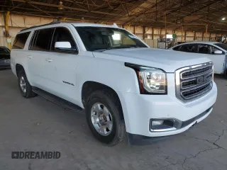 2017 GMC Yukon XL SLE with VIN 1GKS1FKC8HR222023, listed as a Copart auction lot 67496724 with 125,155 mi miles and Salvage Title. Bid and sale history available at carsss.com. Image 4.