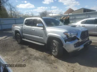2023 Toyota Tacoma SR z VIN 3TMCZ5AN6PM539899, wystawiony jako Copart lot #52238445 z przebiegiem 30 070 mil mil oraz Szkoda całkowita • Salvage title. Historia ofert i sprzedaży dostępna na DreamBid. Obrazek 4.