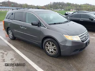 2012 Honda Odyssey EX-L with VIN 5FNRL5H6XCB032366, listed as a IAAI auction lot 41943625 with 73,236 mi miles and . Bid and sale history available at carsss.com. Image 1.