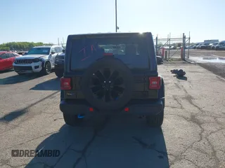 2023 Jeep Wrangler Sahara z VIN 1C4JJXP60PW627051, wystawiony jako IAAI lot #42290712 z przebiegiem 28 269 mil mil oraz . Historia ofert i sprzedaży dostępna na DreamBid. Obrazek 17.