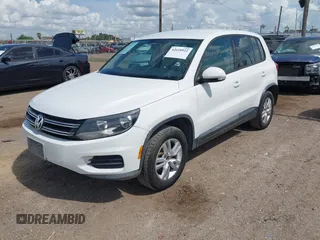 2012 Volkswagen Tiguan SE with VIN WVGAV7AX4CW579341, listed as a IAAI auction lot 42618922 with 118,855 mi miles and . Bid and sale history available at DreamBid. Image 2.