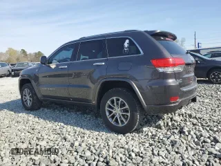 2015 Jeep Grand Cherokee Overland with VIN 1C4RJFCMXFC237723, listed as a Copart auction lot 50318145 with 103,741 mi miles and Salvage title. Bid and sale history available at DreamBid. Image 2.