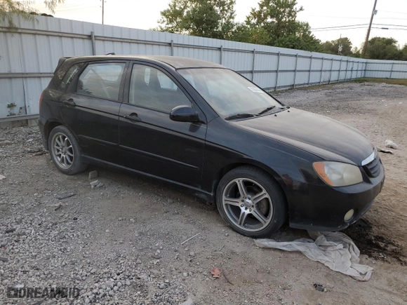 2005 Kia Spectra with VIN KNAFE161255088283, listed as a Copart auction lot 73654744 with 169,947 mi miles and Salvage Title. Bid and sale history available at carsss.com. Image 4.