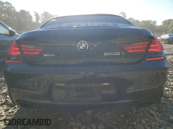 2014 BMW 6 Series 650i xDrive z VIN WBA6B4C54ED371520, wystawiony jako Copart lot #75107784 z przebiegiem 136 077 mil mil oraz Szkoda całkowita • Salvage title. Historia ofert i sprzedaży dostępna na DreamBid. Obrazek 6.