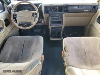 1993 Dodge Caravan Grand SE with VIN 1B4GH44R0PX686790, listed as a Copart auction lot 83757254 with 287,137 mi miles and Salvage Title. Bid and sale history available at carsss.com. Image 8.