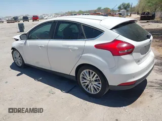 2016 Ford Focus Titanium with VIN 1FADP3N27GL319497, listed as a IAAI auction lot 42385359 with Not provided miles and . Bid and sale history available at DreamBid. Image 3.