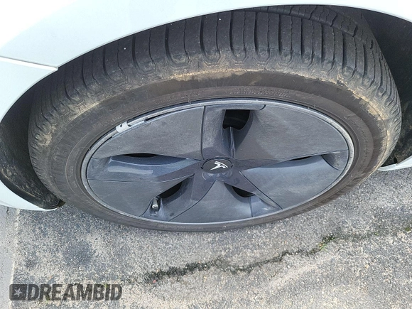 2020 Tesla Model 3 Long Range with VIN 5YJ3E1EB6LF637298, listed as a IAAI auction lot 42248639 with 69,867 mi miles and . Bid and sale history available at DreamBid. Image 26.