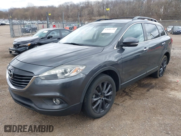 2015 Mazda CX-9 Grand Touring with VIN JM3TB3DV1F0465966, listed as a IAAI auction lot 42049749 with 74,470 mi miles and . Bid and sale history available at DreamBid. Image 17.