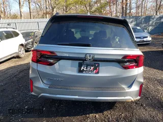 2025 Honda Odyssey EX-L with VIN 5FNRL6H64SB016104, listed as a IAAI auction lot 41456550 with 61 mi miles and . Bid and sale history available at DreamBid. Image 16.