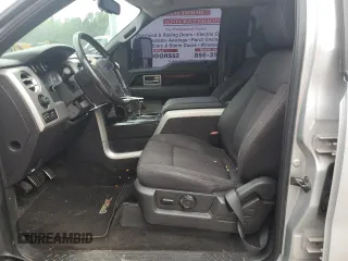2010 Ford F-150 XL with VIN 1FTEW1C81AKB37935, listed as a Copart auction lot 62644595 with 185,465 mi miles and Salvage title. Bid and sale history available at DreamBid. Image 7.