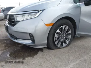2024 Honda Odyssey EX-L with VIN 5FNRL6H67RB046630, listed as a IAAI auction lot 41933690 with 35,880 mi miles and . Bid and sale history available at DreamBid. Image 6.
