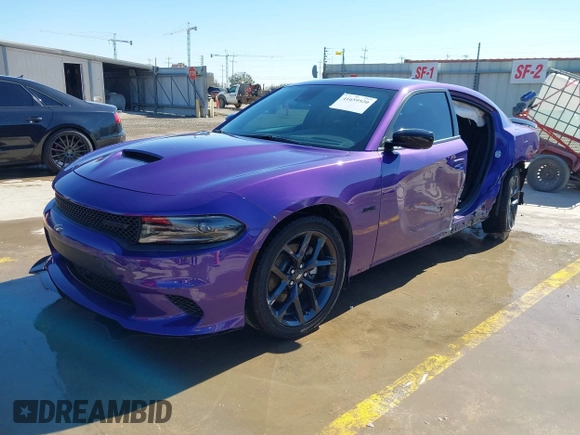 2023 Dodge Charger R/T with VIN 2C3CDXCT3PH690028, listed as a IAAI auction lot 41659520 with 18,754 mi miles and . Bid and sale history available at carsss.com. Image 19.