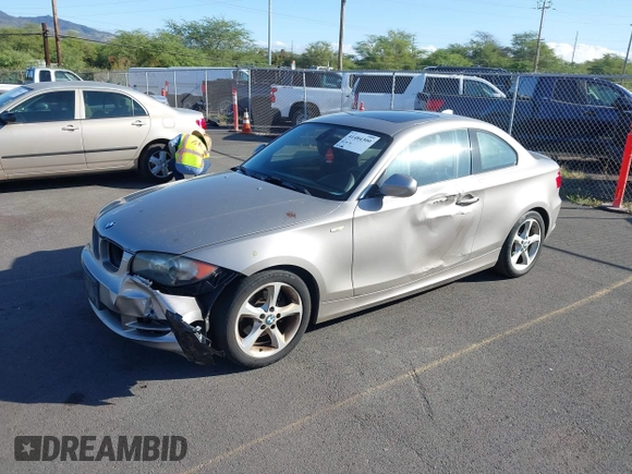 2011 BMW 1 Series 128i with VIN WBAUP7C53BVP21588, listed as a IAAI auction lot 41484300 with 52,124 mi miles. Bid and sale history available at carsss.com. Image 2.