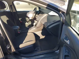 2015 Ford Focus SE with VIN 1FADP3F24FL276766, listed as a IAAI auction lot 41388348 with 59,579 mi miles. Bid and sale history available at carsss.com. Image 5.