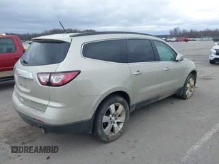 2015 Chevrolet Traverse LTZ z VIN 1GNKRJKD6FJ237851, wystawiony jako IAAI lot #41847524 z przebiegiem 84 809 mil mil oraz . Historia ofert i sprzedaży dostępna na DreamBid. Obrazek 4.