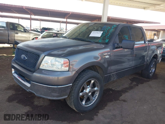 2004 Ford F-150 XLT with VIN 1FTRW12W14KD43052, listed as a IAAI auction lot 41439615 with 241,554 mi miles. Bid and sale history available at carsss.com. Image 2.