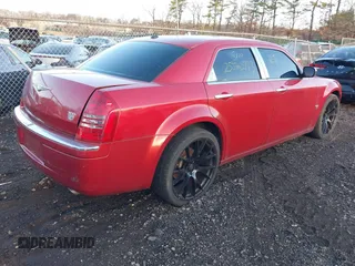 2007 Chrysler 300 C with VIN 2C3KA63H87H697826, listed as a IAAI auction lot 41819347 with 999,999 mi miles. Bid and sale history available at carsss.com. Image 4.