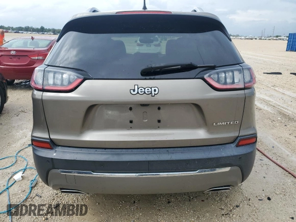 2019 Jeep Cherokee Limited with VIN 1C4PJLDNXKD160045, listed as a Copart auction lot 66154223 with 54,820 mi miles and . Bid and sale history available at DreamBid. Image 6.