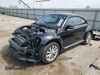 2019 Volkswagen Beetle SE with VIN 3VWJD7AT7KM713002, listed as a Copart auction lot 52454475 with 65,212 mi miles and Salvage title. Bid and sale history available at DreamBid. Image 1.