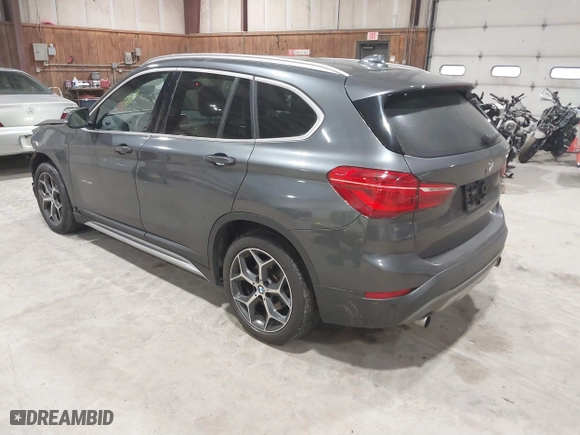 2016 BMW X1 xDrive28i with VIN WBXHT3C3XG5E47536, listed as a IAAI auction lot 41672144 with 97,932 mi miles. Bid and sale history available at carsss.com. Image 3.