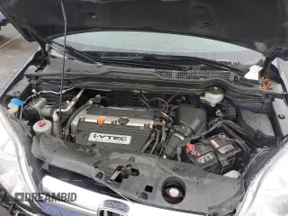 2007 Honda CR-V EX-L z VIN JHLRE38717C027070, wystawiony jako Copart lot #57657375 z przebiegiem 87 603 mil mil oraz Szkoda całkowita • Salvage title. Historia ofert i sprzedaży dostępna na DreamBid. Obrazek 11.