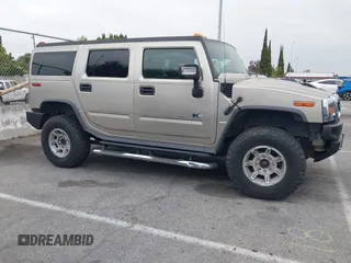 2005 Hummer H2 SUV with VIN 5GRGN23U95H129470, listed as a IAAI auction lot 42046654 with 63,489 mi miles. Bid and sale history available at carsss.com. Image 13.
