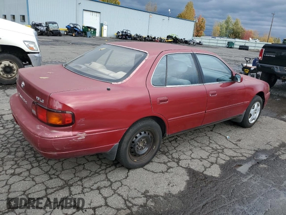 1995 Toyota Camry LE with VIN JT2GK12E6S0102213, listed as a Copart auction lot 77935474 with 166,844 mi miles and Clean Title. Bid and sale history available at carsss.com. Image 3.