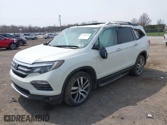 2016 Honda Pilot Touring with VIN 5FNYF6H90GB102403, listed as a IAAI auction lot 42007825 with 69,450 mi miles. Bid and sale history available at carsss.com. Image 2.