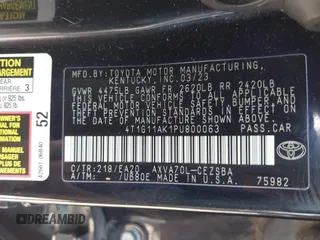 2023 Toyota Camry SE with VIN 4T1G11AK1PU800063, listed as a IAAI auction lot 42121633 with 41,572 mi miles. Bid and sale history available at carsss.com. Image 9.