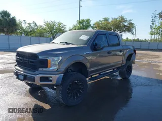 2018 Ford F-150 XL with VIN 1FTEW1EG1JFC31794, listed as a IAAI auction lot 41304111 with 129,058 mi miles and . Bid and sale history available at carsss.com. Image 17.