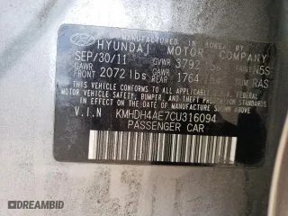 2012 Hyundai Elantra GLS with VIN KMHDH4AE7CU316094, listed as a Copart auction lot 51986305 with 89,930 mi miles and Salvage Title. Bid and sale history available at carsss.com. Image 12.