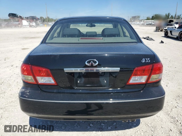 2003 Infiniti I35 Luxury z VIN JNKDA31A73T115221, wystawiony jako Copart lot #47275925 z przebiegiem 72 851 mil mil oraz Czysty tytuł • Clean title. Historia ofert i sprzedaży dostępna na DreamBid. Obrazek 6.