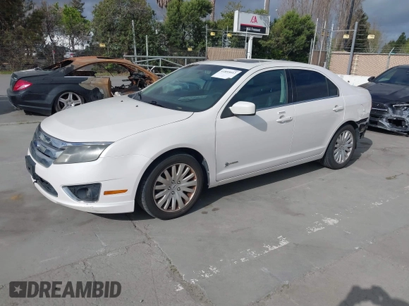 2010 Ford Fusion Hybrid with VIN 3FADP0L36AR140242, listed as a IAAI auction lot 41895012 with 236,943 mi miles and . Bid and sale history available at DreamBid. Image 2.
