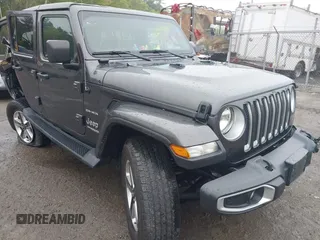 2022 Jeep Wrangler Unlimited Sahara z VIN 1C4HJXEG6NW267825, wystawiony jako IAAI lot #42192465 z przebiegiem 49 094 mil mil oraz . Historia ofert i sprzedaży dostępna na DreamBid. Obrazek 1.