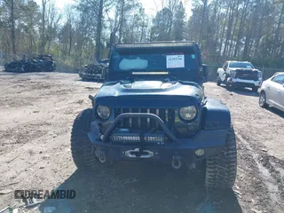 2015 Jeep Wrangler Unlimited Rubicon with VIN 1C4BJWFG9FL755152, listed as a IAAI auction lot 41293766 with 109,153 mi miles. Bid and sale history available at carsss.com. Image 13.